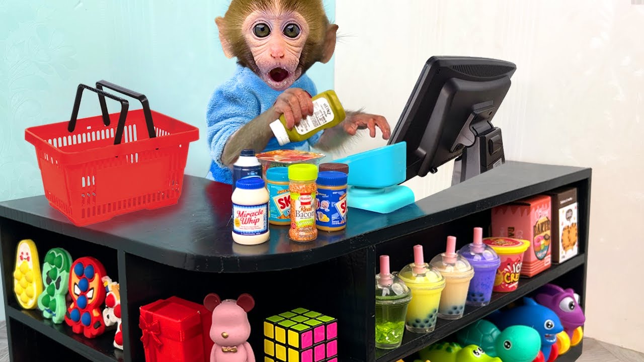 Monkey Baby Bon Bon pretend to be a cashier in a supermarket and eats watermelon with puppy img